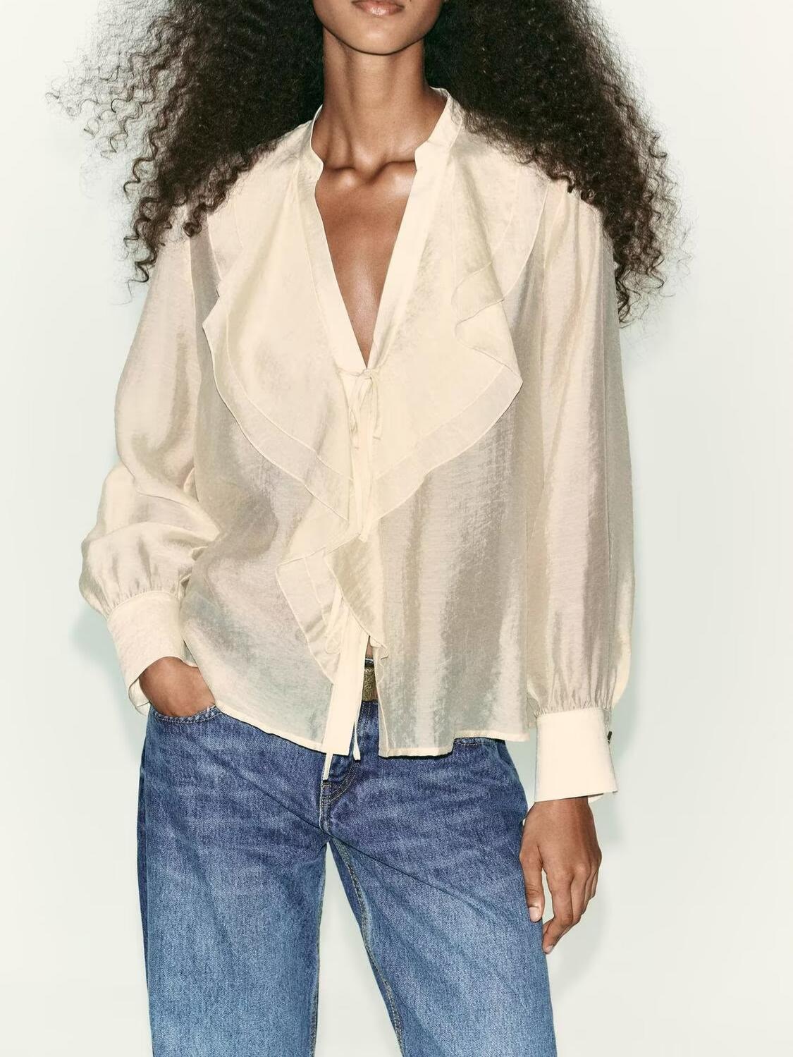 Camisa con lazo, decoración laminada y corte femenino de otoño