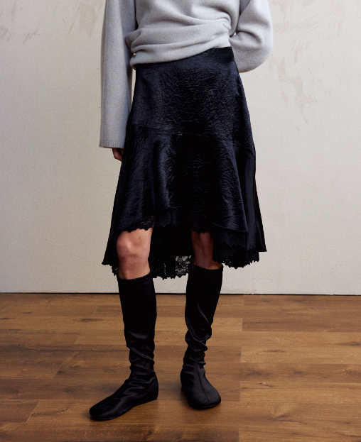 Falda elegante asimétrica irregular de satén y encaje con bajo cosido a la moda