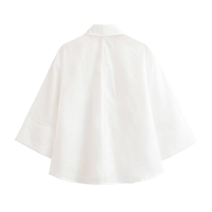 Chemise verticale pour femme à col polo et motif floral en relief, collection été