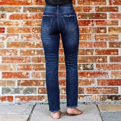 Pantalones de mezclilla ajustados de tiro alto con lavado elástico, borla de lana, bolsillos, corte entallado, dobladillo acampanado y deshilachado para mujer